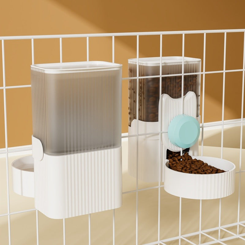 Pet food dispenser with multiple compartments on a tiled wall.