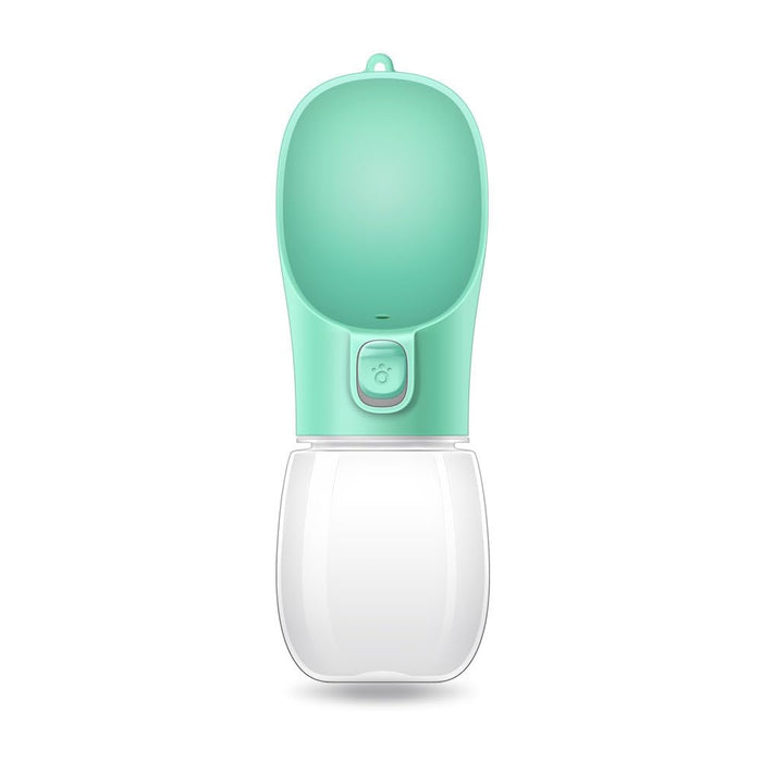 Portable pet water bottle with a green top and clear base on a white background