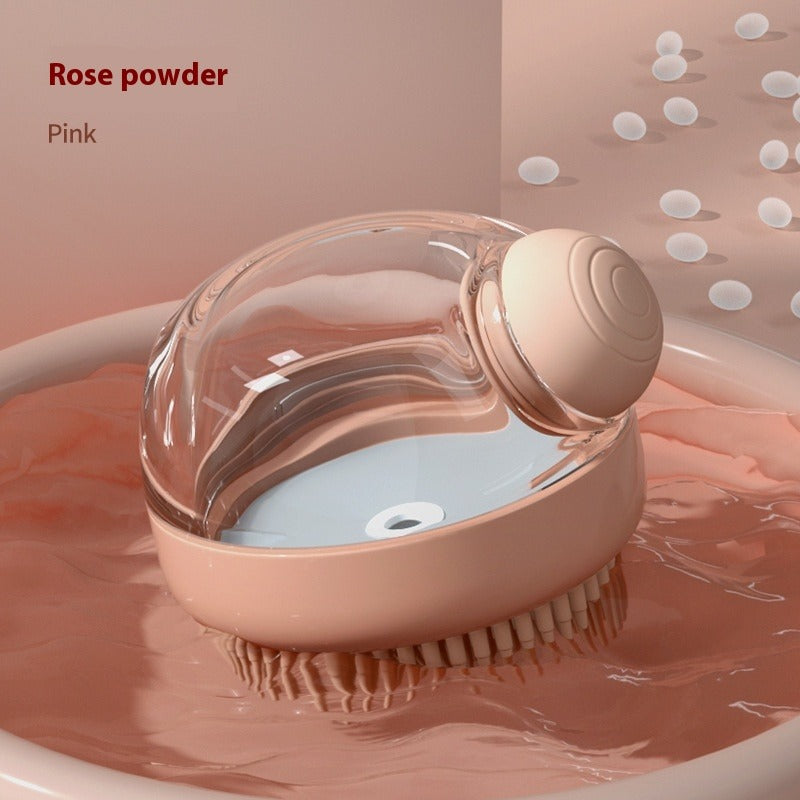 Bath brush with pink handle and clear bristle head on a pink background with bubbles.