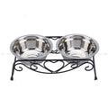 Double stainless steel pet bowl set on a decorative black metal stand with heart design.