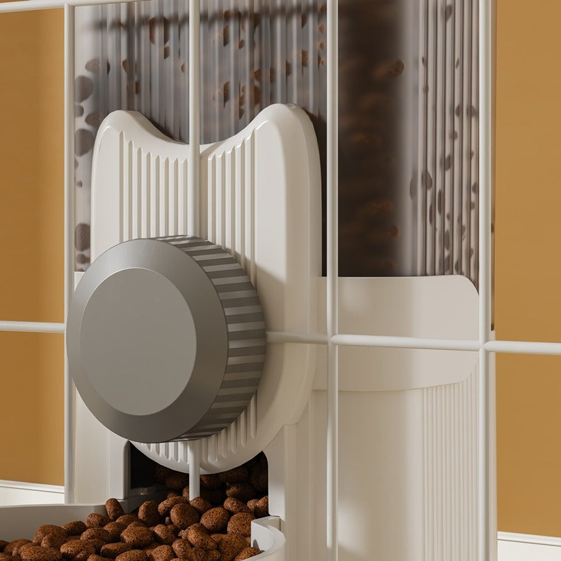 Pet food dispenser with food inside, mounted on a wall.